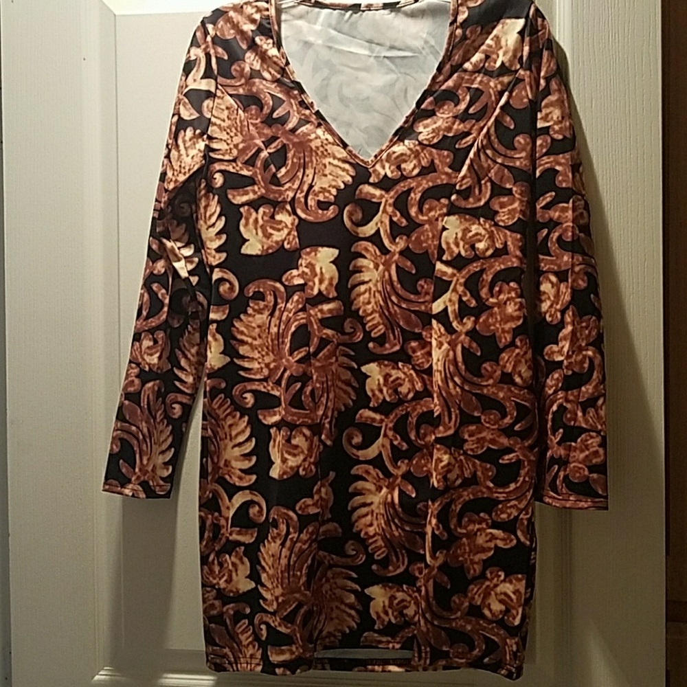 SOLD Sexy V neck printed sheath dress